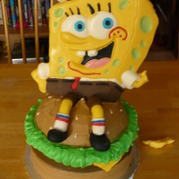 Wilton "3-D" Spongebob On A Krabby Patty Wilton replica. Spongbob was molded in a cake pan with confectionary coating and decorated in buttercream (instead of fondant as in the...