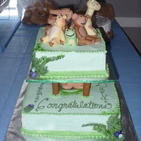 Jungle Baby Shower My personal creation/design! A lot of fun to make. Animals and baby were made with fondant. Two-tier, supported with fondant-covered...