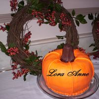 Pumpkin Cake First pumpkin cake. Recipe from bmoore chocolate pumpkin cake, two bundt cakes. Buttercream frosting. Chocolate covered ice cream cone for...