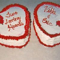 Two Loving Hearts inspired by a design in the wilton yr book, flowers are silk