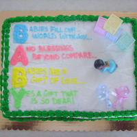 Unisex Baby Shower All buttercream with the exception of the plastic accessoriesidea was from a Wilton yearbook