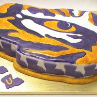 Lsu Eye Of The Tiger I hand carved this from a 12 x 18, covered it in fondant and then hand painted it.