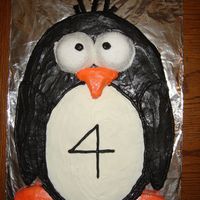 Penguin I made this cake for a little girl in my neighborhood who loves penguins. This was a huge hit!! This is one of my favorite cakes!