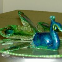 Practice Peacock - Second View Inspired by all the sculpting and molding that I've seen on CC lately...Got my inspiration while flipping channels and saw peacocks on...