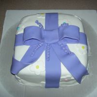 Course Iii Bow Cake Forgot to cover my base board! The moisture soaked up into the card board, didn't notice it until I looked at the pic!