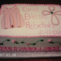 Baby Dedication another view of my most recent cake. 10X15 strawberry filling bc icing and mmf accents.