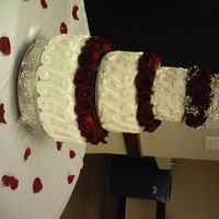 Dcfc0229.jpg Wedding cake I did a few weekends back. White Almond Sour Cream with Strawberry filling for bottom; Butter cake with chocolate and Bav....