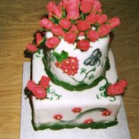 Scan0006.jpg This cake is MMF, I tried something new painting!!!. The cake really didin't look like I wanted so I gave it to my friend who works in...