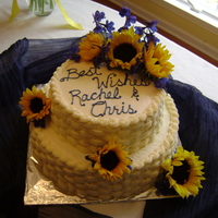 Bridal Shower Basketweave in buttercream with fresh sunflowers and blue flowers (forget the name of them!)...