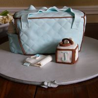Baby Shower Diaper Bag Cake 3D Blue & Brown This cake was for my dear friend's baby shower. The theme was baby blue & chocolate colors w/ paisley & dots so wanted to keep...