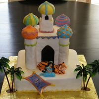 Princess Jasmine Castle Rahjah Aladdin Cake This was for my daughter's 5th birthday. She asked for Jasmine's castle with Jasmine and Rahjah in front. Flying carpet was last...