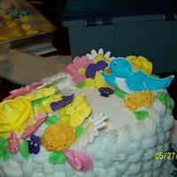 100_0880.jpg Final cake for Wilton course 2. Wish it had come out better..