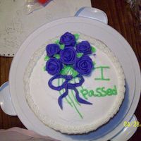 100_0862.jpg Wilton course 1 final cake....I'm a terrible rose maker but it didnt come out that bad....