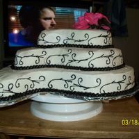 100_0773.jpg This is a practice wedding cake my first try. Its all buttercream