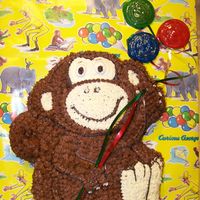Tristans_1St_Birthday_Cake.jpg I used the Wilton Monkey pan and added cookie's for balloons