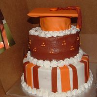 Orange And Brown Graduation Cake 