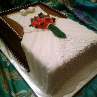 Another View Of Bridal Shower Cake french vanilla cake with chocolate buttercream and fondant accents.