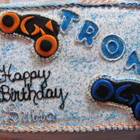 Tron white cake-buttercream icing-fondant tron cycles
