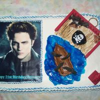 Cullen/sparrow strawberry cake with fondant accents(boat and squid legs) bc icing. edible transfer...Made this cake for my daughters 21st birthday. She...