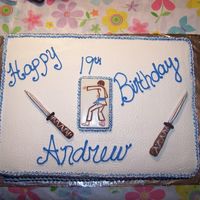 Karate Birthday Cake made this cake for a karate class mate of my sons. half white/half chocolate. Fondant swords and painted candy mold. Buttercream icing. TFL...