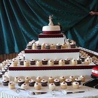 Wedding Cup Cake Tower red black and white wedding with 150 cupcakes small top cake and a fire truck for grooms cake. white and chocolate cake filled with...
