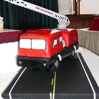 Fire Truck fire truck grooms cake. the lights and sirens work. the groom loved it.