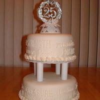 25Th Anniversary Vanilla and chocolate cakes covered with vanilla bc then covered in MMF. Writing done in bc.