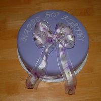 Simply Fondant Vanilla cake w/ BC and MMF. Ribbon attached the bottom. I love these cakes because they are so easy and you don't have to worry about...