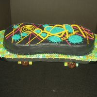 Skateboard At the request of my 9 year old grandson...not my best work...had to transport cake 100 miles in car; therefore, chose to use a larger...