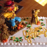 Fall Greetings Made for a cake auction at my nephews school for Halloween. It is all edible. The scarecrow is made using a ice cream cone as a base.