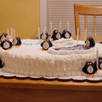 Penguin Birthday Cake Birthday cake for my niece. She is very into penguins at the moment. There was one penguin on the cake for her and each girl she invited to...