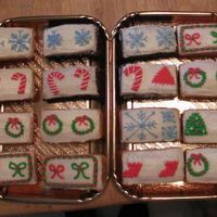 Christmas Mini Cakes Mini Cakes...all cream cheese frosting. 4 different kinds of cakes - chocolate, white, orange and lemon. Made 78 mini cakes as gifts. Baked...