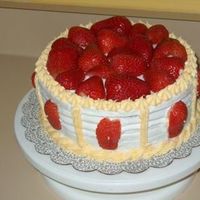 Strawberry Delight I was experimenting with strawberries. The frosting was either almond or buttercream. It had a fresh strawberry mousse filling. It was a...