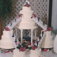 My Personal Wedding Cake My first wedding cake, my own cake. The cake was traditional white with cream cheese filling and bc icing. The cake served 500+ guests....