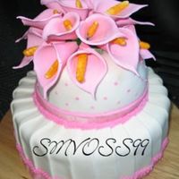 Pink Calla Lilies Gumpaste calla lilies with rolled color sugar for stamen. Marshmallow fondant covered cake. Grand champion winner at the local fair '...