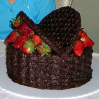 Chocolate Strawberries Cake Triple chocolate cake made for my husband's 92 yr. old grandmother's birthday. Two-2.5 inch layers and strawberry filling make up...