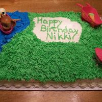 Littlest Petshop Pets Birthday The grass was made with Wilton tip 233. I used a flat tip for the water and just swirled it to look wavy. Instead of a top border, I made...