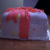 1St Fondant Cake I wasn't able to take course 3, so I bought the book and did this myself. I thought it came out ok, considering I had to figure it out...