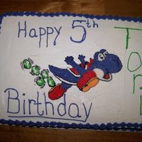 Yoshi Birthday My nephew drew the picture, which I transposed on to the cake. When I was done I put edible glitter on it to make it stand out more.