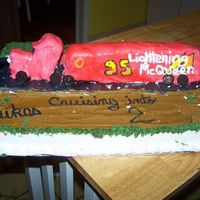 Cars Mac Truck Side View The top is a cake that I made with a bread pan, carved and assembled into the shape of Mac. I used mini oreo cookies for the wheels. The...