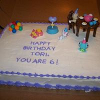 Littlest Pet Shop I love doing these kinds of cakes for my kids because they get extra toys. I made the furniture out of chocolate so that the table and...