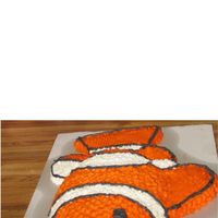 Nemo Cake My nephew who is a big fish fan asked for a Nemo cake for his Groom's cake - forgot to cover the cake board and didn't take a...