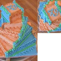 Birthday Tower Vanilla cake, layered up and iced with blue and orange fondant icing to give the appearance of a winding staircase!, Royal icing...
