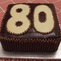 80Th Birthday Chocolate Cake, with chocolate ganache icing, mint matchmaker edging and white chocolate nunbers