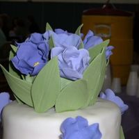 Tulip Cake Topper - Close Up This is the top of the tulip wedding cake, just close up. It is gumpage tulips and leaves. I ended up sticking the leaves in the cake so...