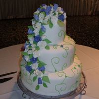 Wedding Cake This is my first official wedding cake order! :) It is 14", 10", & 6". All chocolate, buttercream frostered and covered...