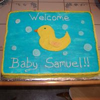 Duckie Baby Shower This is a full white sheet cake iced in BC. The duckie is freehanded on the cake and was taken from the invitations/napkins used at the...