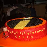 Incredibles Cake 2 I used an oval pan and piped the emblem using a sketch. The cake is chocolate with whitechocolate butter cream. The figure is supposed to...