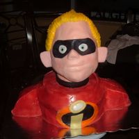 Incredibles Cake 1-Dash This is the second incredibles cake for this particular party. The head is made out of paper mache which I did a week in advance-I then...