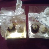 Bride/groom Cake Ball Wedding Favors bride and groom cake pops boxed and wrapped to give out as wedding favors.Im quite proud of this one!